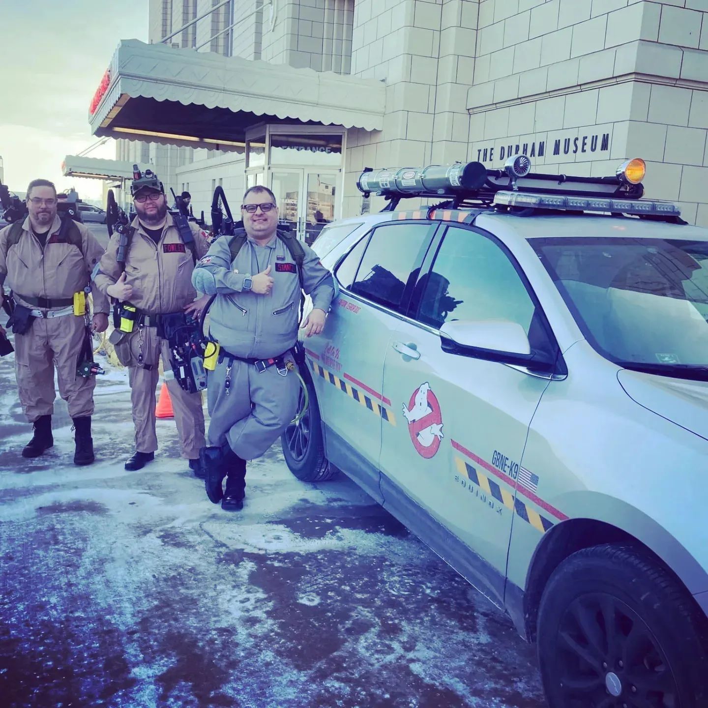 Damian, The EctoK9 Unit, and members of Ghostbusters - Nebraska Division at an event.