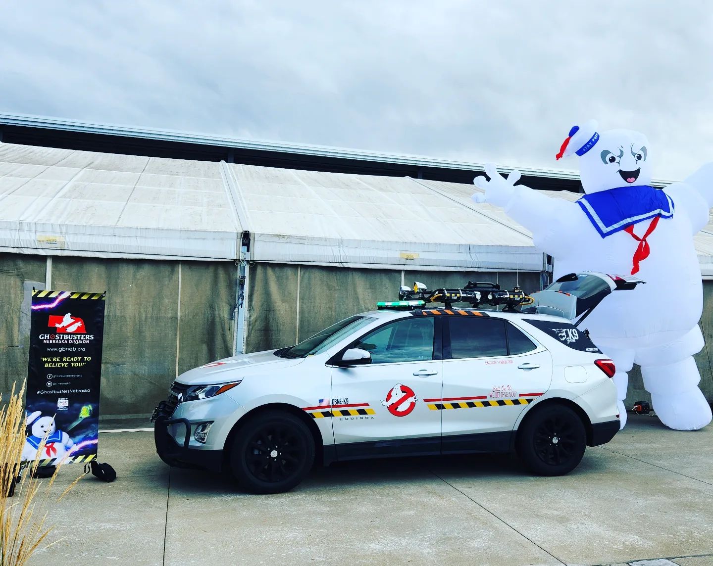 The EctoK9 Unit setup for an event and ready to bust the giant inflatable Stay Puft Marshmallow Man parked behind it.